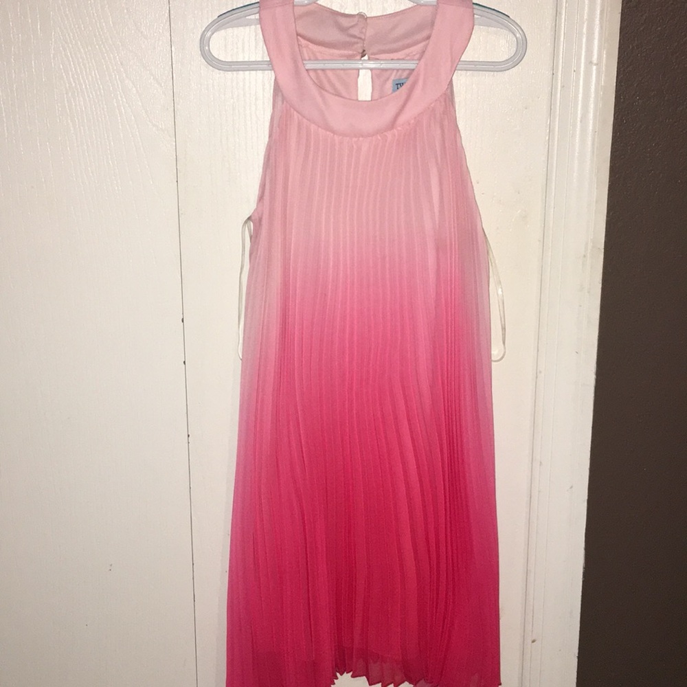 This beautiful dress is like new! Only worn once!